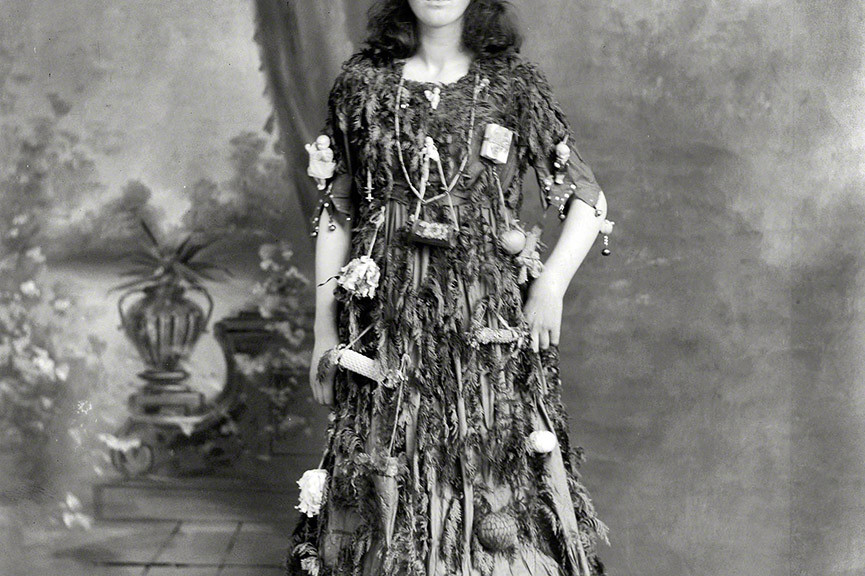 Young woman as a Christmas tree. Half-plate glass negative by Adam Maclay. New Zealand circa 1910.